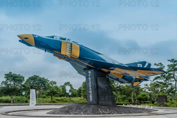 Phantom F-4 fighter jet mounted on stand on permanent display at museum in Jeju, South Korea, Asia