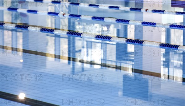Dividing ropes delimit swimming lanes in the swimming pool of the reopened Tiergarten municipal