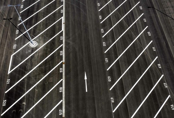 Aerial view of a lorry parking area with streamlined and numbered parking spaces, Grünheide, 23.04