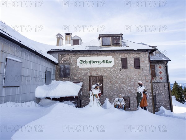 Group of figures of the Three Wise Men in the snow, Schafbergalm, Sankt Wolfgang am Wolfgangsee,