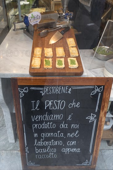 Information board on daily freshly made basil pesto, a speciality in Genoa, Italy, Europe