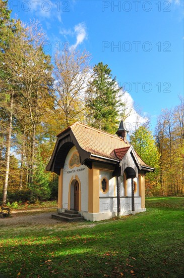Hubertus Chapel in autumn-coloured forest near Oberschönenfeld in the Augsburg Western Forests