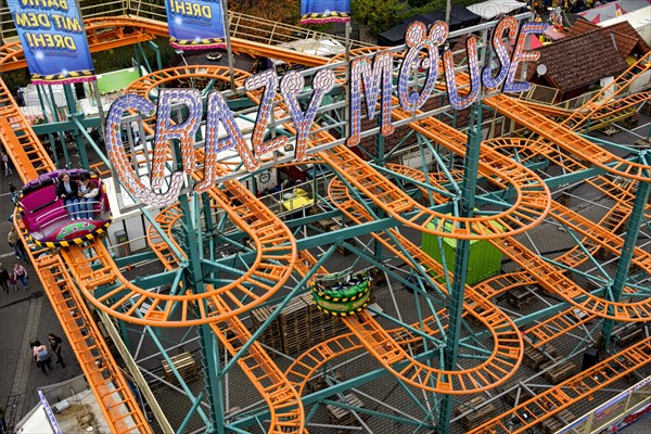 Roller coaster Crazy Mouse, rails, winding tracks of the railway, ride at fairground Kalter Markt,