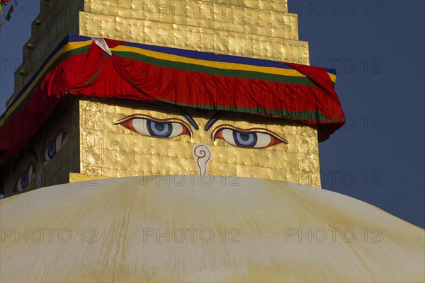 All-seeing eyes of Buddha, the Wisdom Eyes or Buddha's eyes, painted on the golden spire of