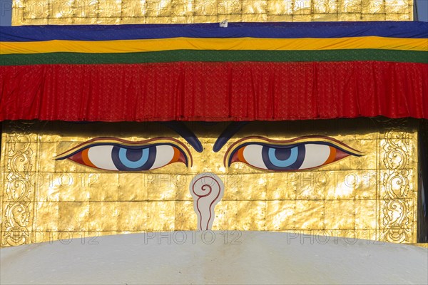 All-seeing eyes of Buddha, the Wisdom Eyes or Buddha's eyes, painted on the golden spire of