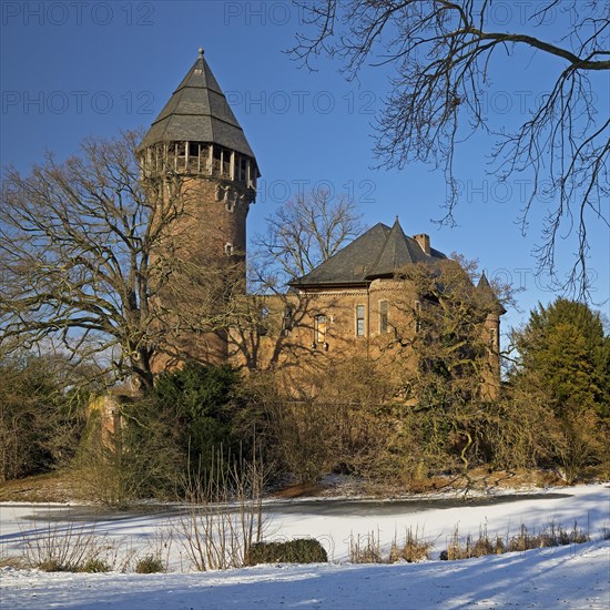 Linn Castle moated castle in Krefeld-Linn in winter, Krefeld, Lower Rhine, North Rhine-Westphalia,
