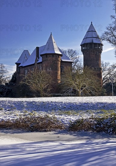 Linn Castle moated castle in Krefeld-Linn in winter, Krefeld, Lower Rhine, North Rhine-Westphalia,