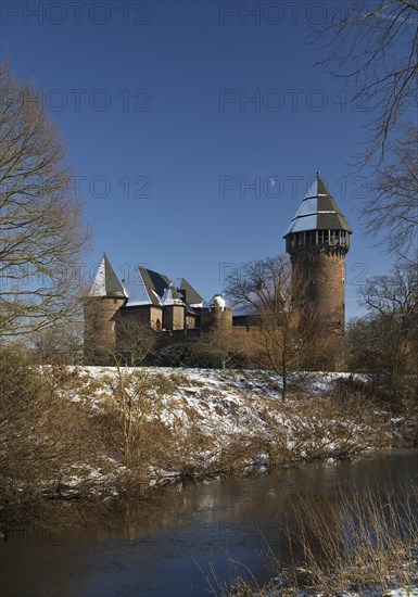 Linn Castle moated castle in Krefeld-Linn in winter, Krefeld, Lower Rhine, North Rhine-Westphalia,