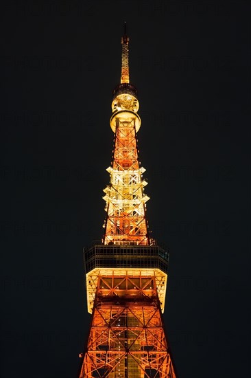 Tokyo Tower illuminated at night, communications and observation tower in the Shiba-koen district