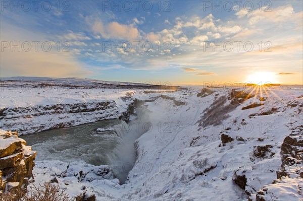 Gullfoss waterfall in the snow in winter located in the canyon of Hvítá river, Haukadalur,