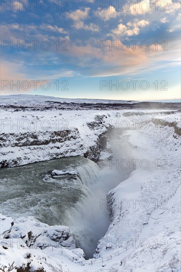 Gullfoss waterfall in the snow in winter located in the canyon of Hvítá river, Haukadalur,
