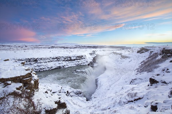 Gullfoss waterfall in the snow in winter located in the canyon of Hvítá river, Haukadalur,