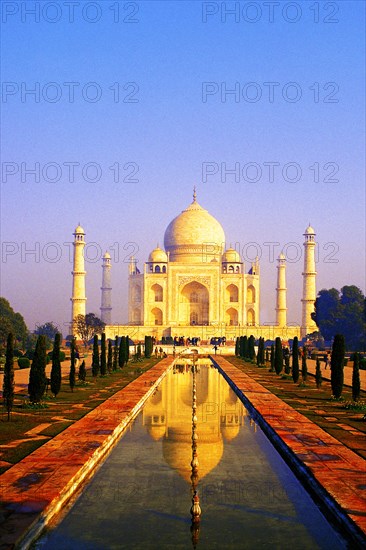 Classic early-morning view of the Taj Mahal reflecting in still water, Agra, India, Asia