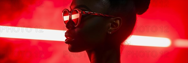 Strong portrait of a woman with glasses, characterised by red neon lines and her silhouette, AI