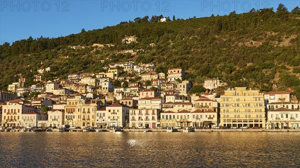 Dense development along the coast, glowing in the light of the morning sun, Gythio, Mani,