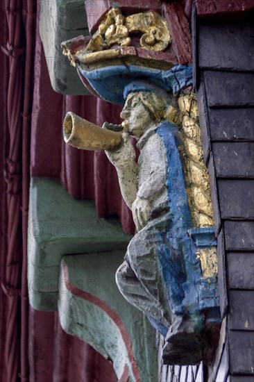Carved wooden figure on a historic half-timbered house, Morlaix, Departements Finistere, Brittany,