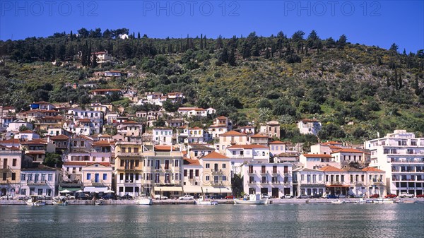 View of a coastal town with traditional architecture along the sea, Gythio, Mani, Peloponnese,