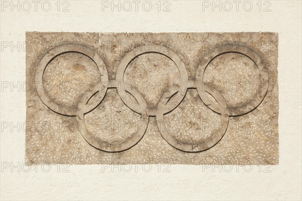 Olympic rings at the Olympic Stadium, 1936 venue of the Winter Games, torchbearer,