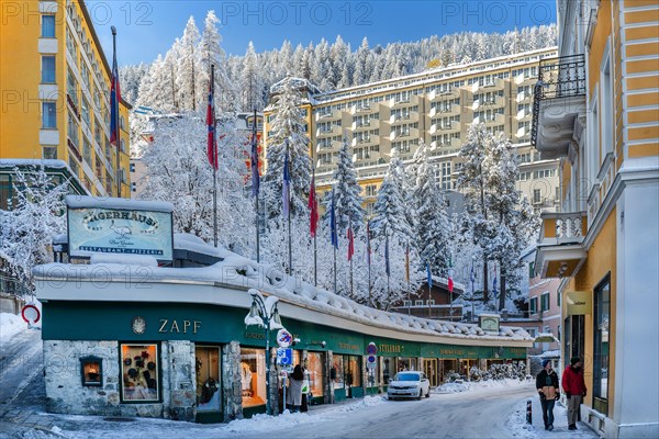 Winter main street in the town centre with shops and hotels, Bad Gastein, Gastein Valley, Hohe