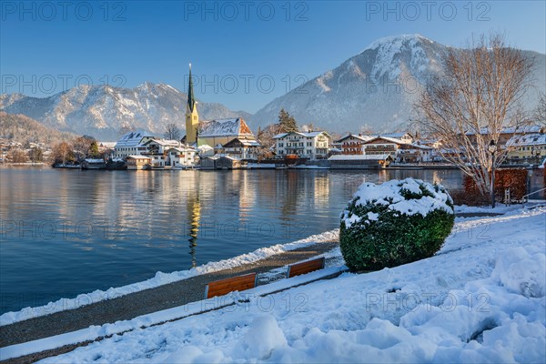 Snowy winter view of Malerwinkel with parish church and Wallberg 1722m, Rottach-Egern, Tegernsee,