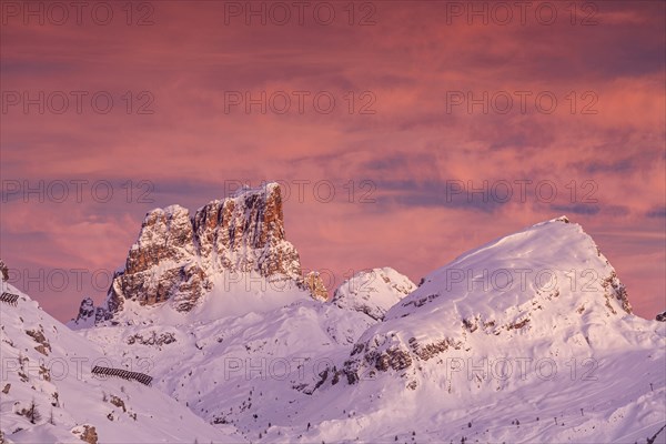 Dawn over snow-covered mountains, winter, view from the Falzarego Pass to Averau, Dolomites, South