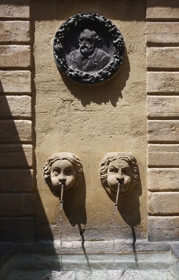 Fontaine des Bagnier, the Medallion, a portrait by Paul Cezanne, after a drawing by Auguste Renoir,