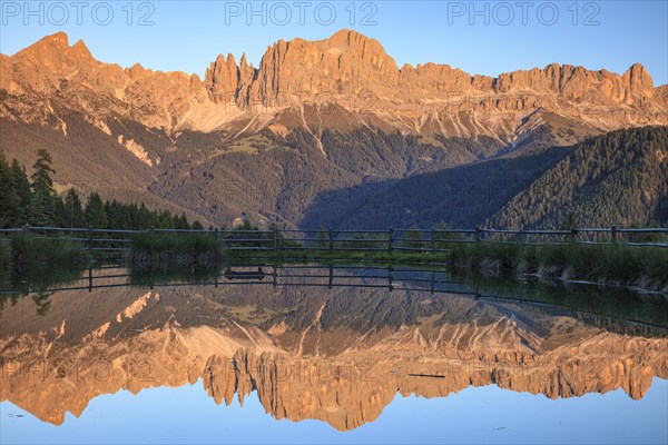 Mountains reflected in a small mountain lake, sunset, evening light, Wuhnleger, view of rose
