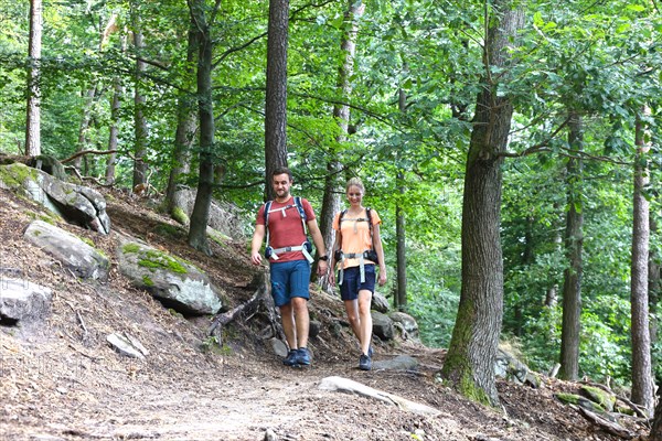 Symbolic image: Young couple hiking in the Palatinate Forest, here on the fifth stage of the