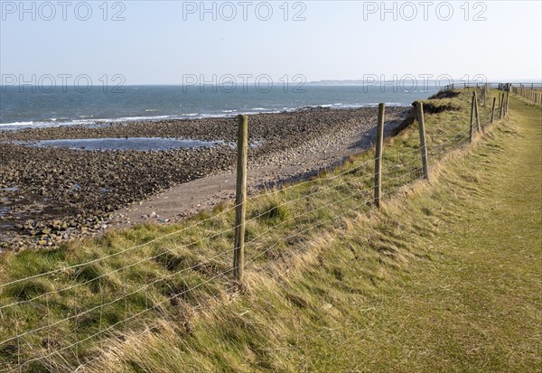 Coastline landscape scenery looking south towards Farne Islands, Holy Island, Lindisfarne,
