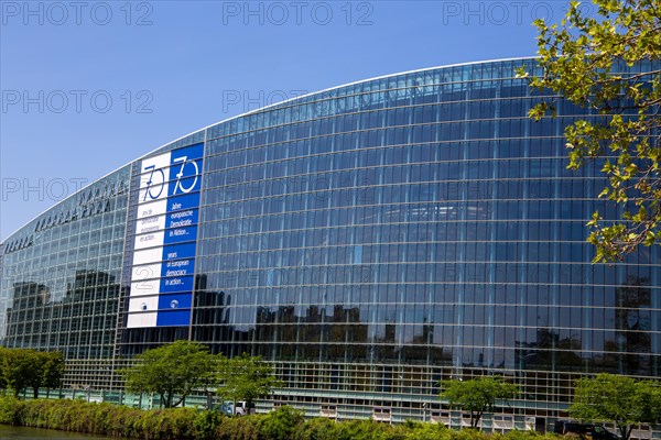 The back of the European Parliament in Strasbourg On the glass facade you can see a huge banner
