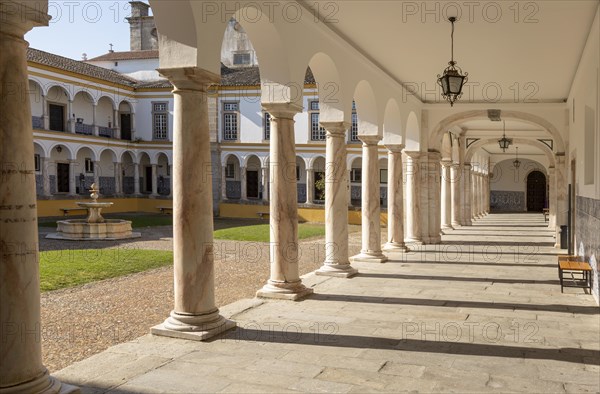 Cloisters collonade marble columns historic courtyard Evora University, Evora, Alto Alentejo,