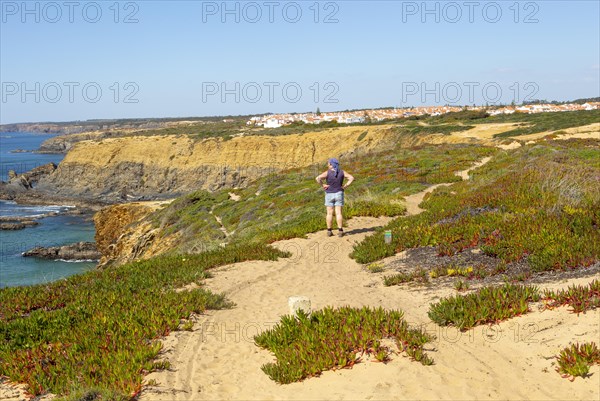 Woman walking Rota Vicentina, near Zambujeira do Mar, Alentejo Littoral, Portugal, Southern Europe,
