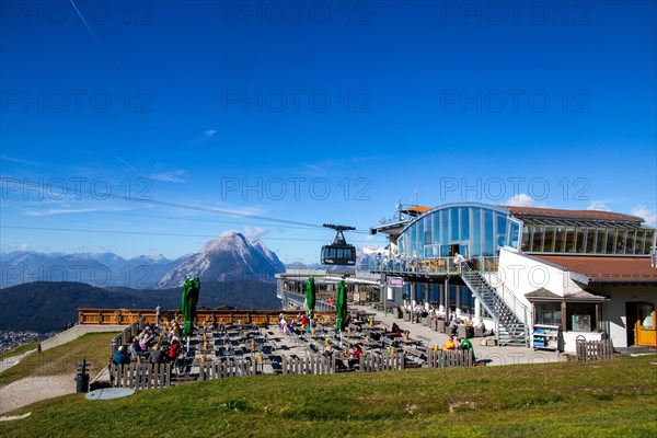 Rosshuette mountain station in Seefeld/Tyrol. Many tourists and locals take advantage of the sunny