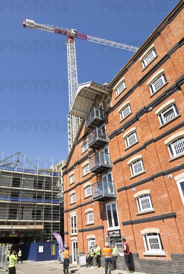Tall crane at construction site of the 'Wine Rack' building, Waterfont, Wet Dock, Ipswich, Suffolk,