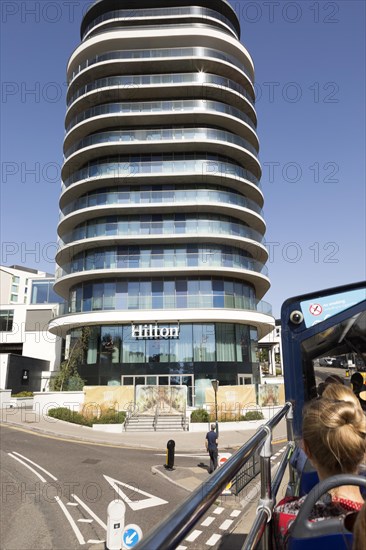 Modern architecture of Hilton Hotel, Bournemouth, Dorset, England, UK from top of passing