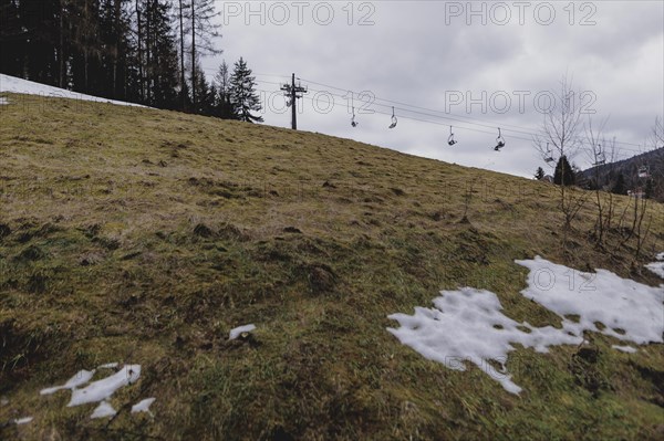 A chairlift, photographed on a ski slope in the Jizera Mountains ski resort near Albrechtice v