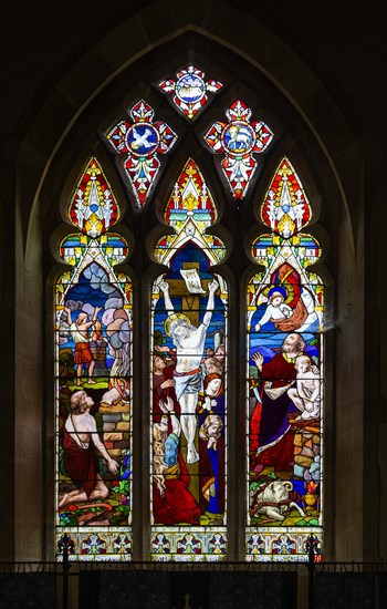 Stained glass window Washbrook church, Suffolk, England, UK by Ward and Hughes c 1870 Crucifixion