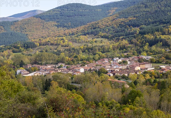 Autumnal countryside landscape view of forests, mountains and village of Valganon, La Rioja, Spain,