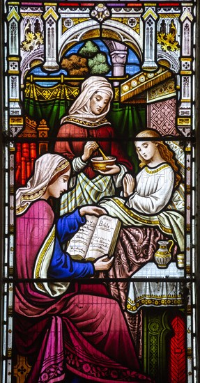 Stained glass west window detail Acts of Mercy, 1878, Great Bealings church, Suffolk, England, UK
