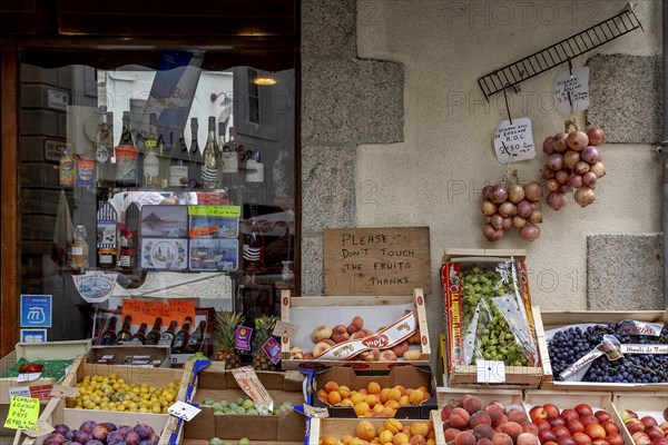 Shop with a range of different types of fruit and the famous Roscoff onions, Roscoff, Brittany,
