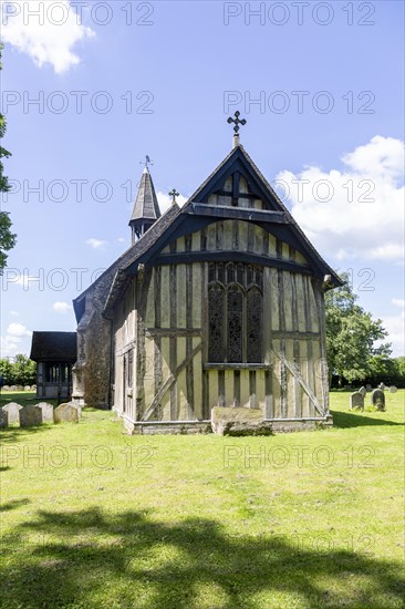 Village parish church of All Saints, Crowfield, Suffolk, England, UK with wooden timber framed