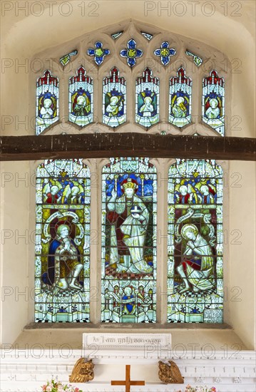 Stained glass east window Christ the King, Hacheston church, Suffolk, England, UK c 1919 war