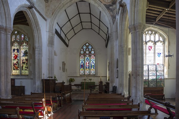 Village parish church of All Saints, Chelsworth, Suffolk, England, UK view to chancel and east
