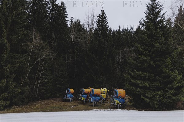 Snow cannons, photographed on a ski slope in the Jizera Mountains ski resort near Albrechtice v