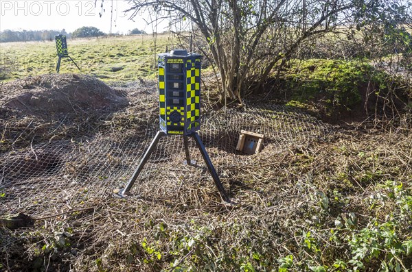 Eviction of badgers clearance of badger sett using metal fencing and one way exit gates, part of