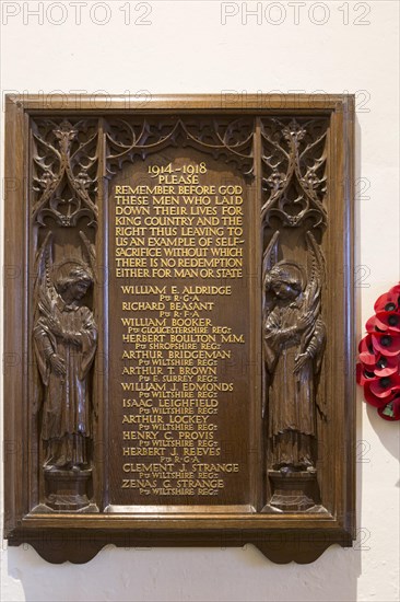 Elaborately carved wooden Arts and Crafts First World War 1914-1918 memorial, All Saints church,