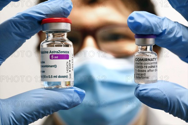 Vaccination vials with the Covid19 Biontech Pfizer vaccine Comirnaty and the Covid19 vaccine Astra