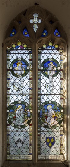 Stained glass window in church of Saint Margaret, South Elmham, Suffolk, England, UK c 1917