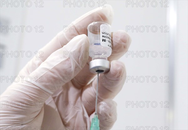 Syringes are filled with the Covid19 Biontech Pfizer vaccine Comirnaty in a vaccination centre by