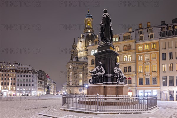 The old town centre of Dresden with its historic buildings. Neumarkt with monument to King